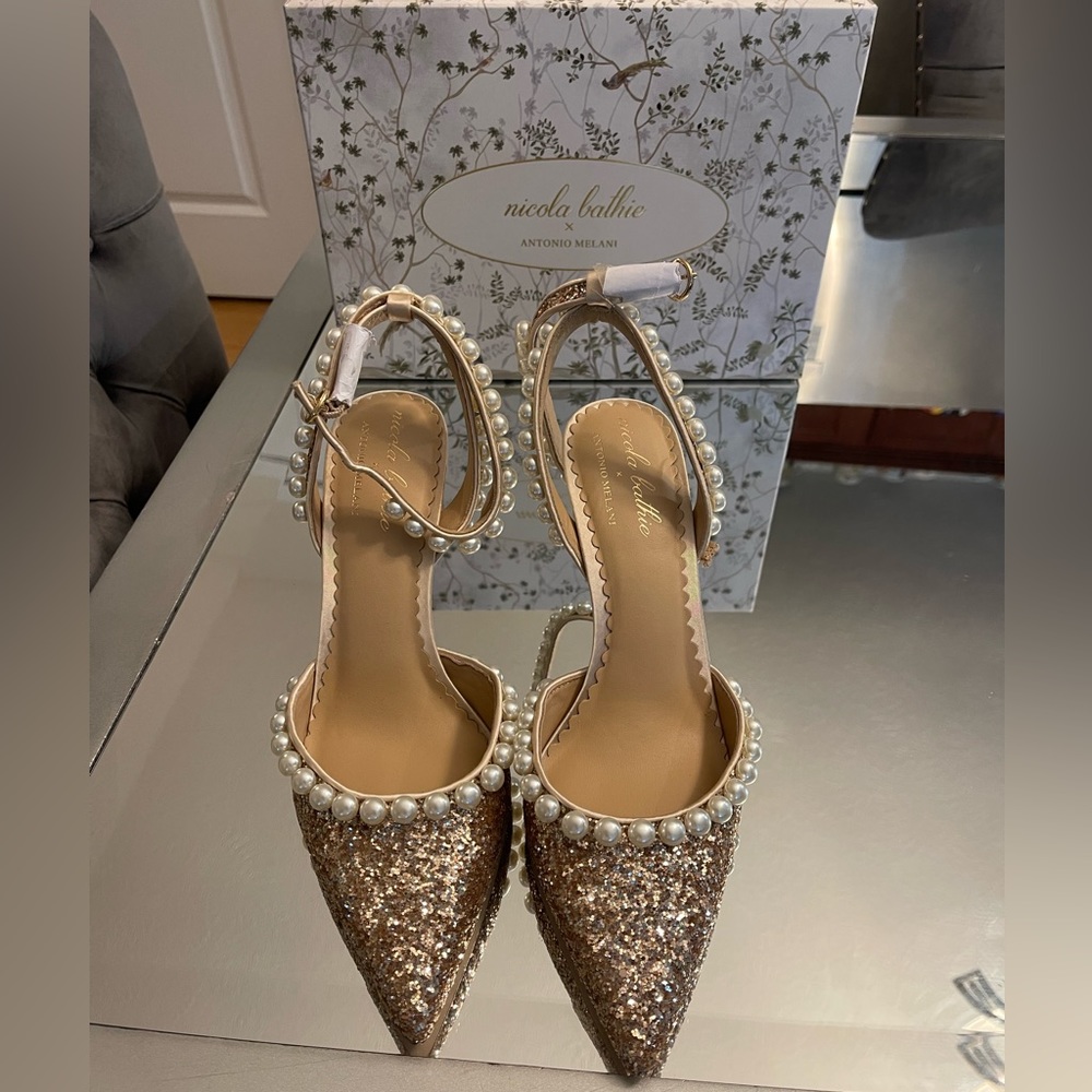 × Nicola Bathie Bebe Ankle Strap Glitter
Pearl Detailing Pumps